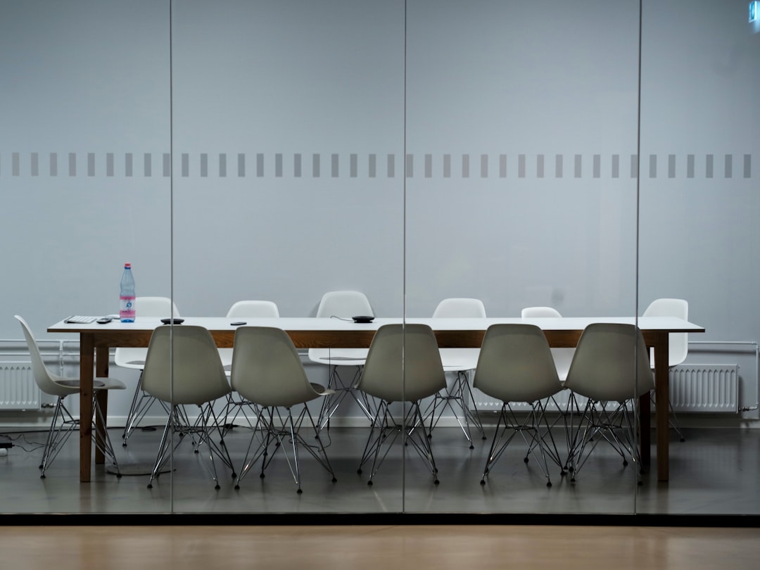 Meeting room with a wooden table and warm natural light
